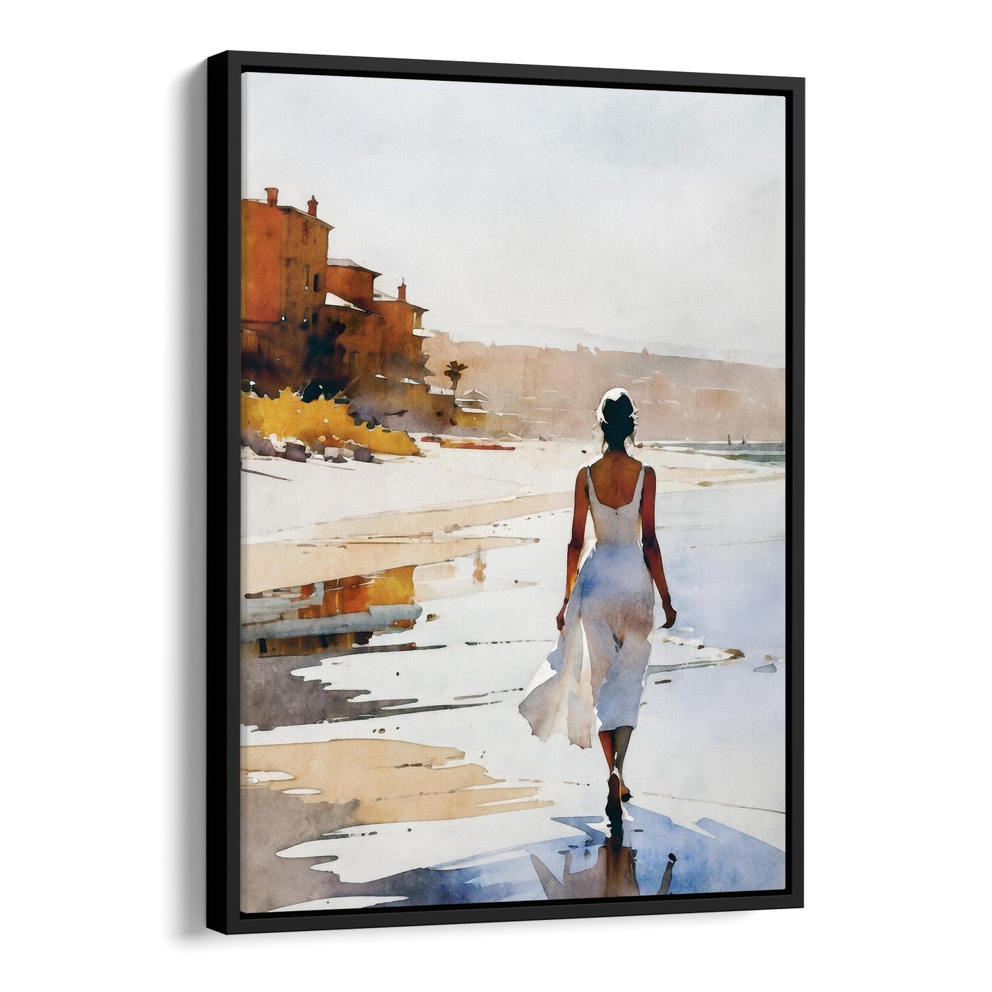 A black framed canvas print of a watercolor painting showing a woman in a flowing white dress walking barefoot along the beach.