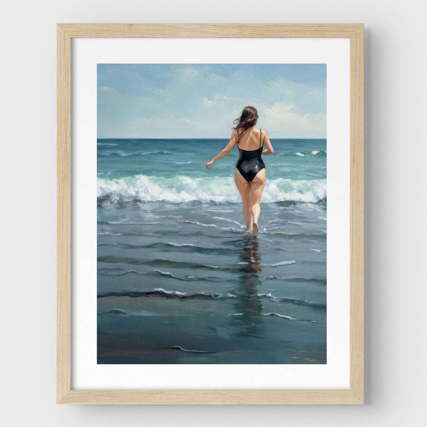 Framed painting of a woman in a black swimsuit walking into the ocean waves, with white border and a natural wood frame against a light background.