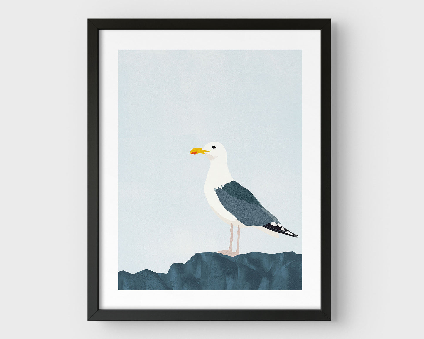 Minimalist illustration of a seagull perched on a dark blue rock against a pale blue sky, framed in black with a white border.
