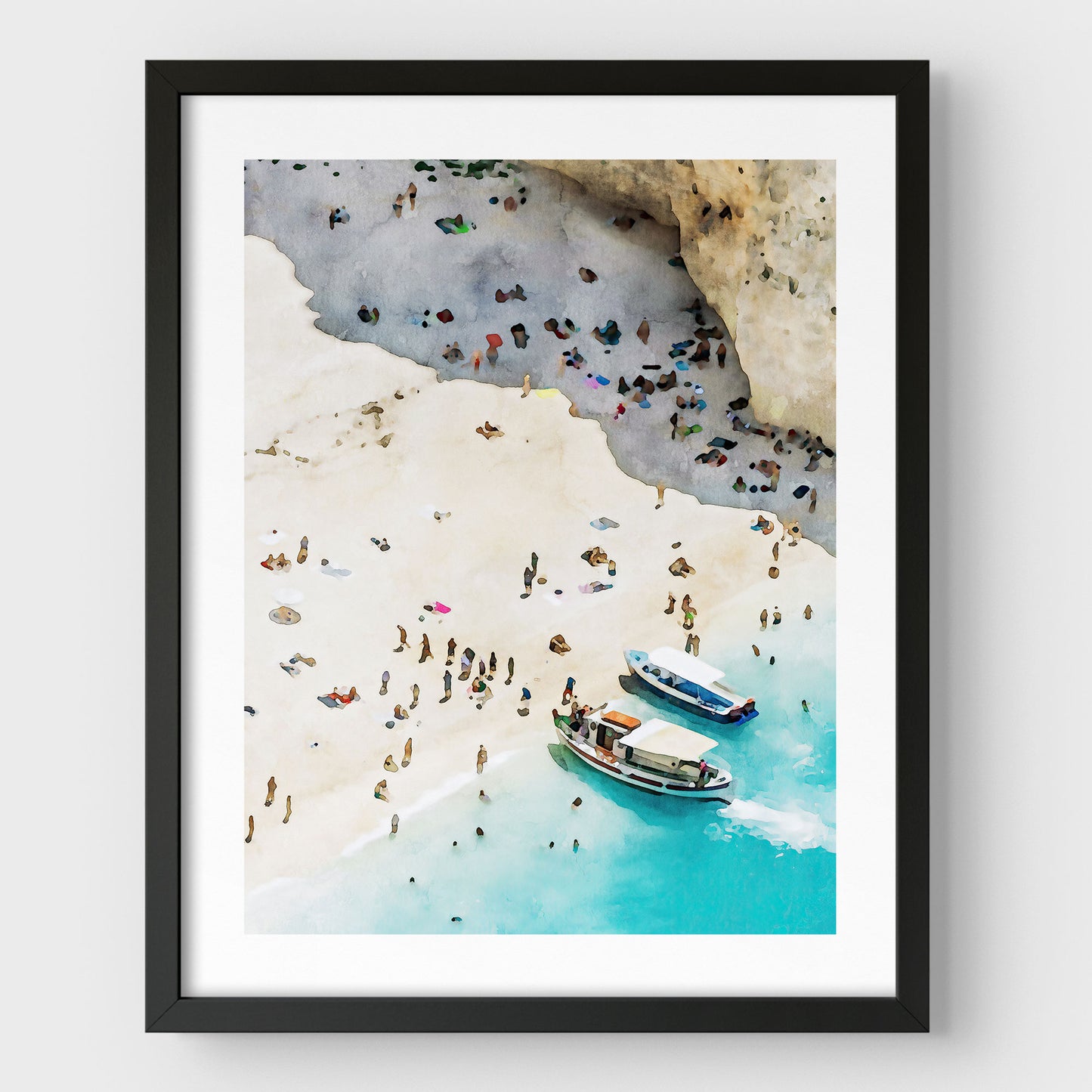 Black framed artwork featuring a watercolor-style depiction of a beach with two boats docked near the shore, surrounded by people enjoying the sandy beach and turquoise water.