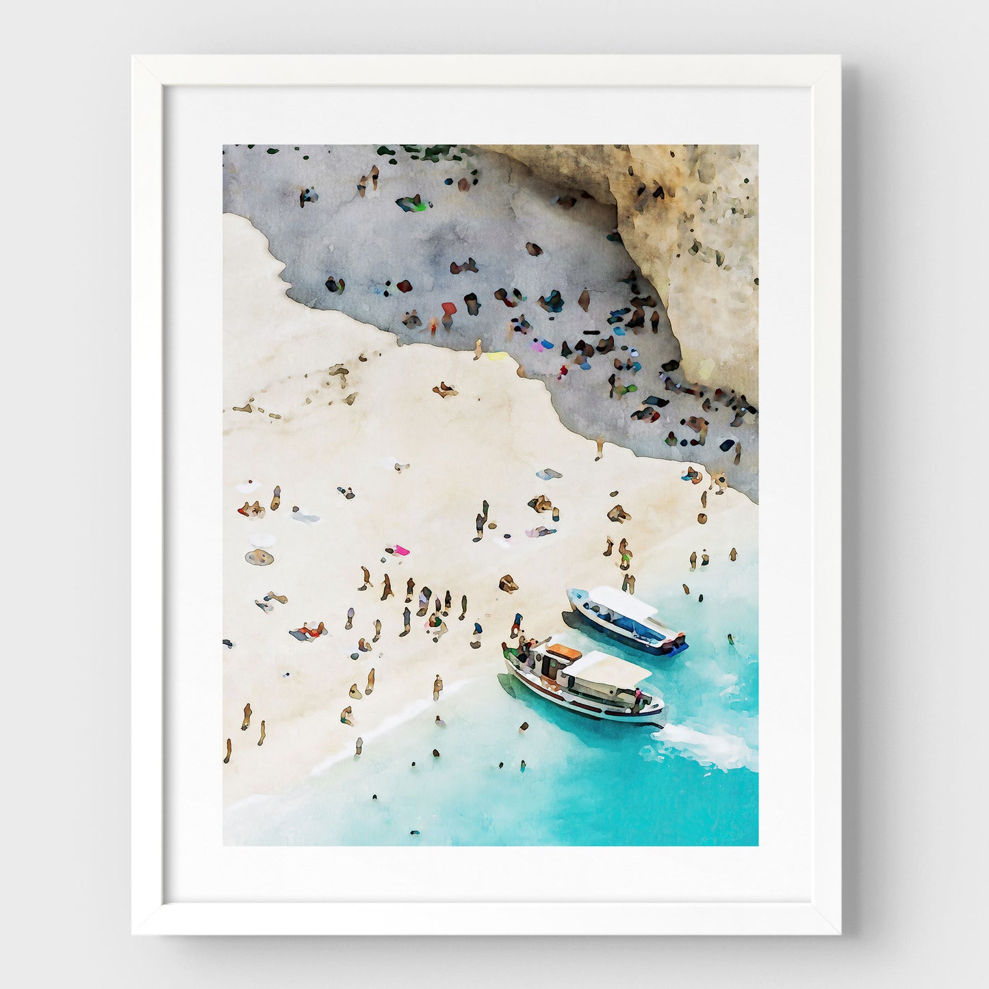 White framed artwork featuring a watercolor-style depiction of a beach with two boats docked near the shore, surrounded by people enjoying the sandy beach and turquoise water.
