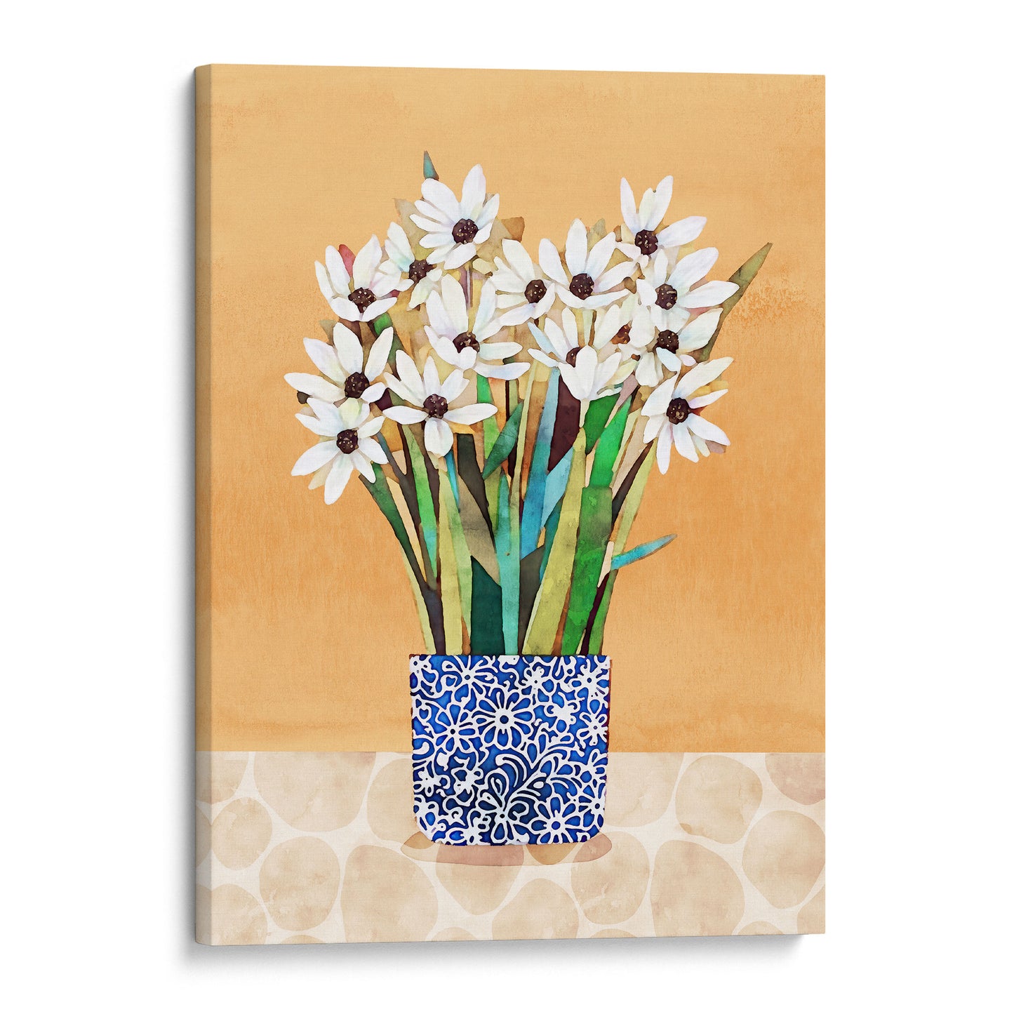 Canvas artwork of white flowers with dark centers in a blue patterned vase, displayed on a patterned beige surface against an orange backdrop.