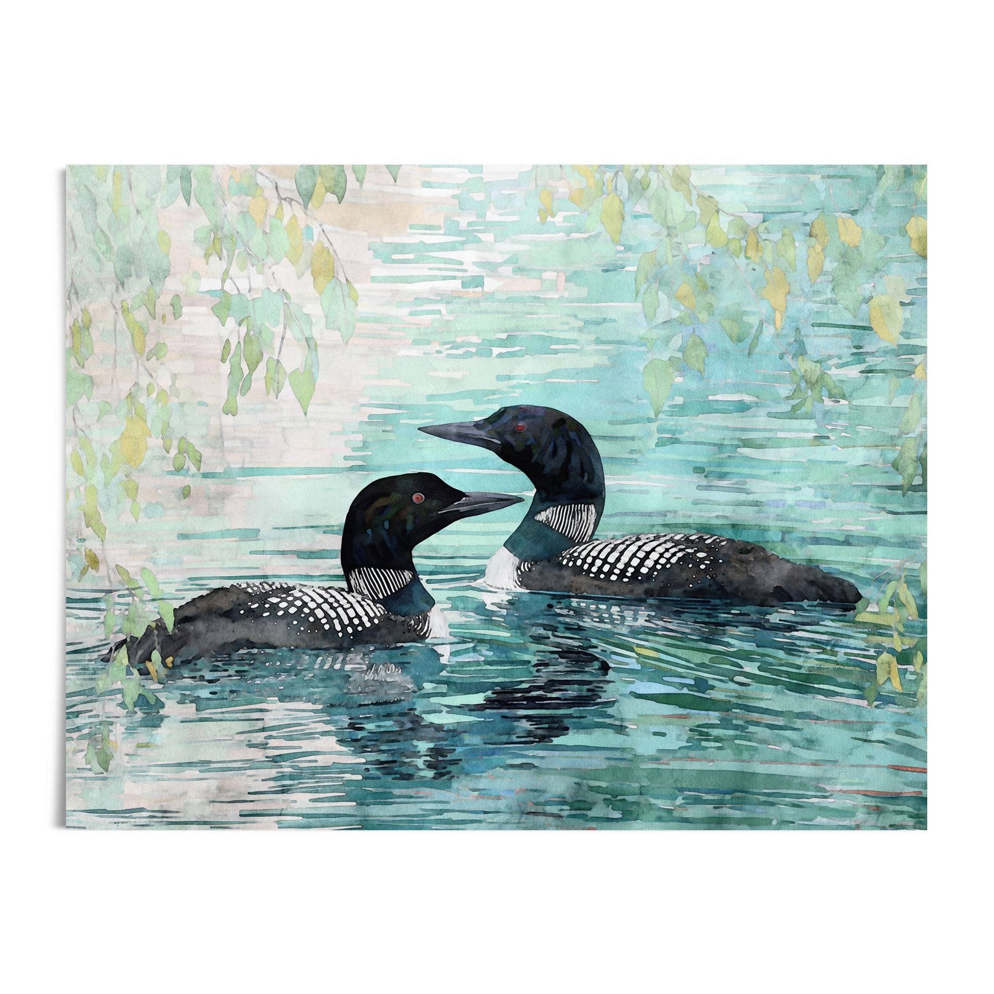 Watercolor painting of two loons floating on a calm lake, with reflections rippling across blue-green water. Their black heads, red eyes, and white-striped plumage stand out against leafy branches hanging above. The artwork is shown on a plain white background, emphasizing the serene nature scene.