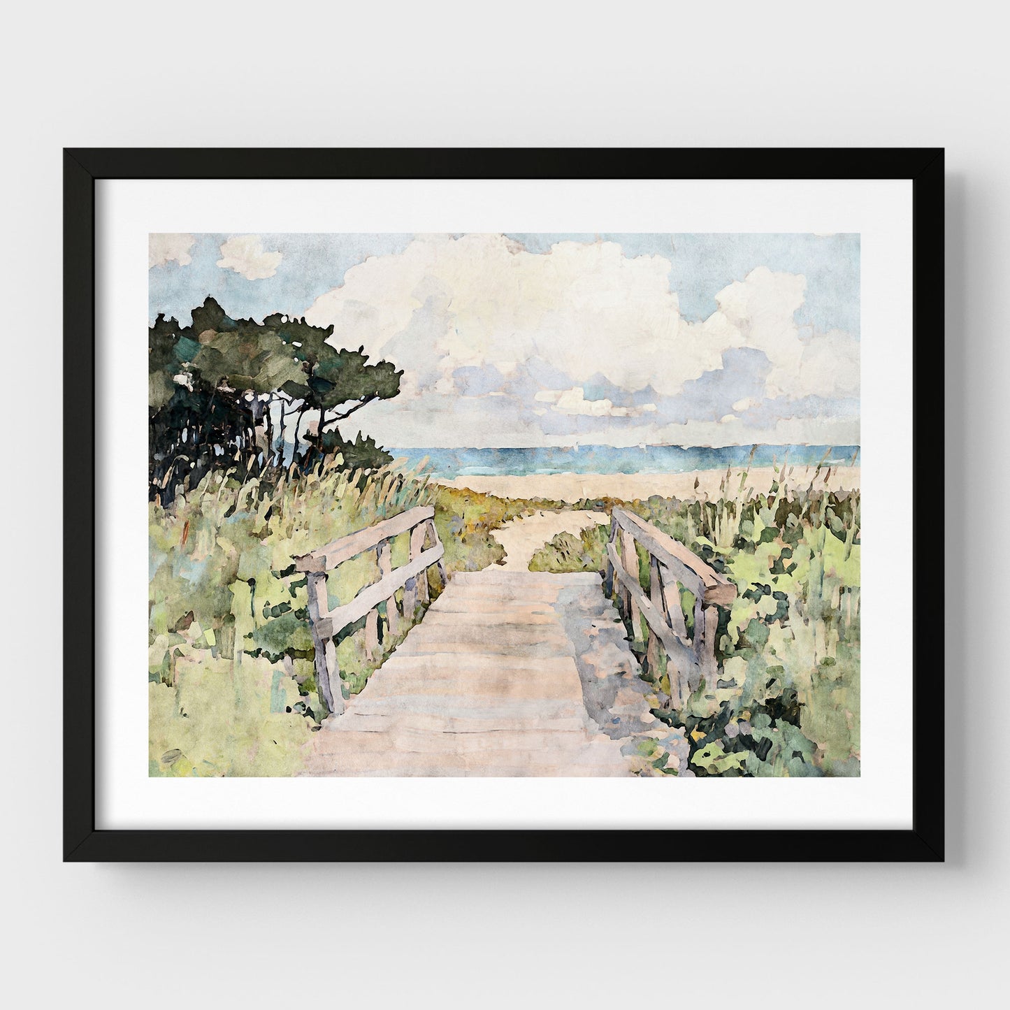 Black framed watercolor art print featuring a sandy boardwalk flanked by weathered wooden rails, leading through beach grass toward a serene ocean horizon. Soft clouds drift across a pale blue sky, while windswept pine trees on the left add contrast and balance to the gentle coastal palette.