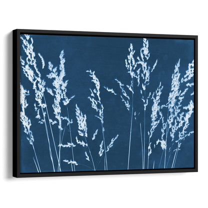 Framed cyanotype print featuring white wild grass silhouettes against a deep blue background, enclosed in a sleek black frame.
