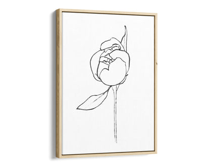 Natural wood framed canvas print of a minimalist line drawing depicting a peony bud with a single leaf, set against a white background.