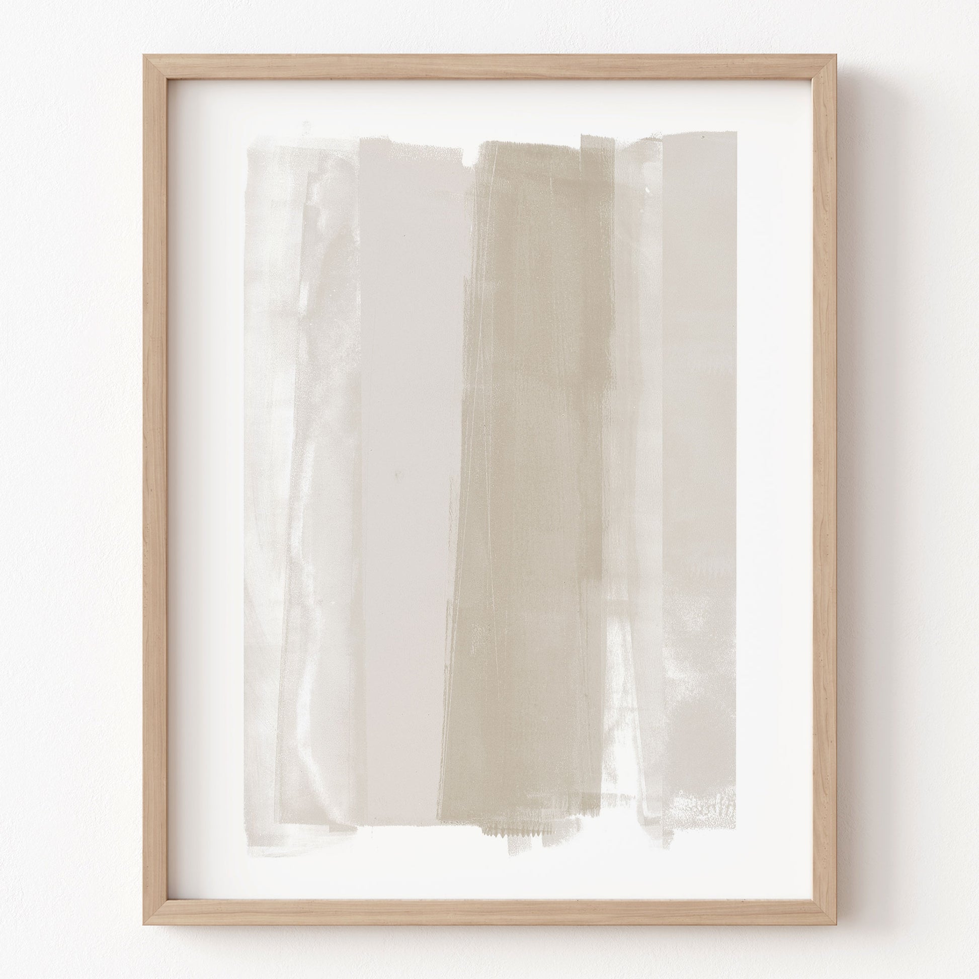 Framed abstract art with horizontal brush strokes in beige and white on a white background