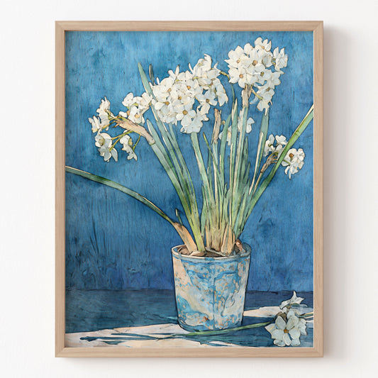Framed artwork of a potted plant with white flowers on a blue background