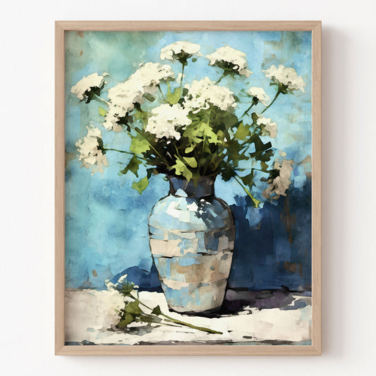 Framed artwork of a vase with white flowers on a blue background