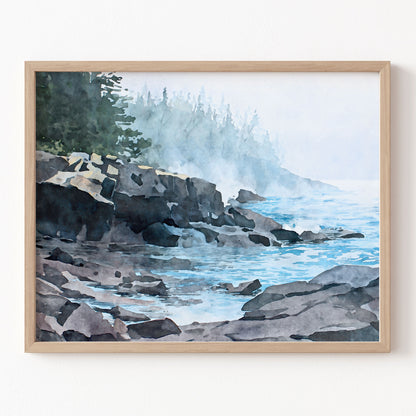 Framed artwork of a coastal scene with rocks and water.