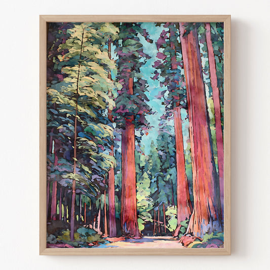 Framed painting of a forest with tall trees on a white wall