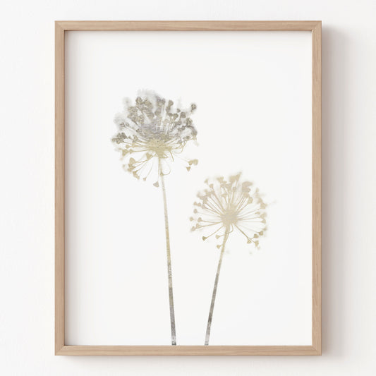 Framed artwork of two floral silhouettes on a white background
