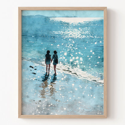 Watercolor-style art print of two women walking hand in hand along a sunlit shoreline, surrounded by shimmering waves and soft reflections in shades of blue. Set against a white background for a clean, modern presentation.