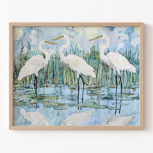 Framed artwork of three white birds on a water surface with a natural background.
