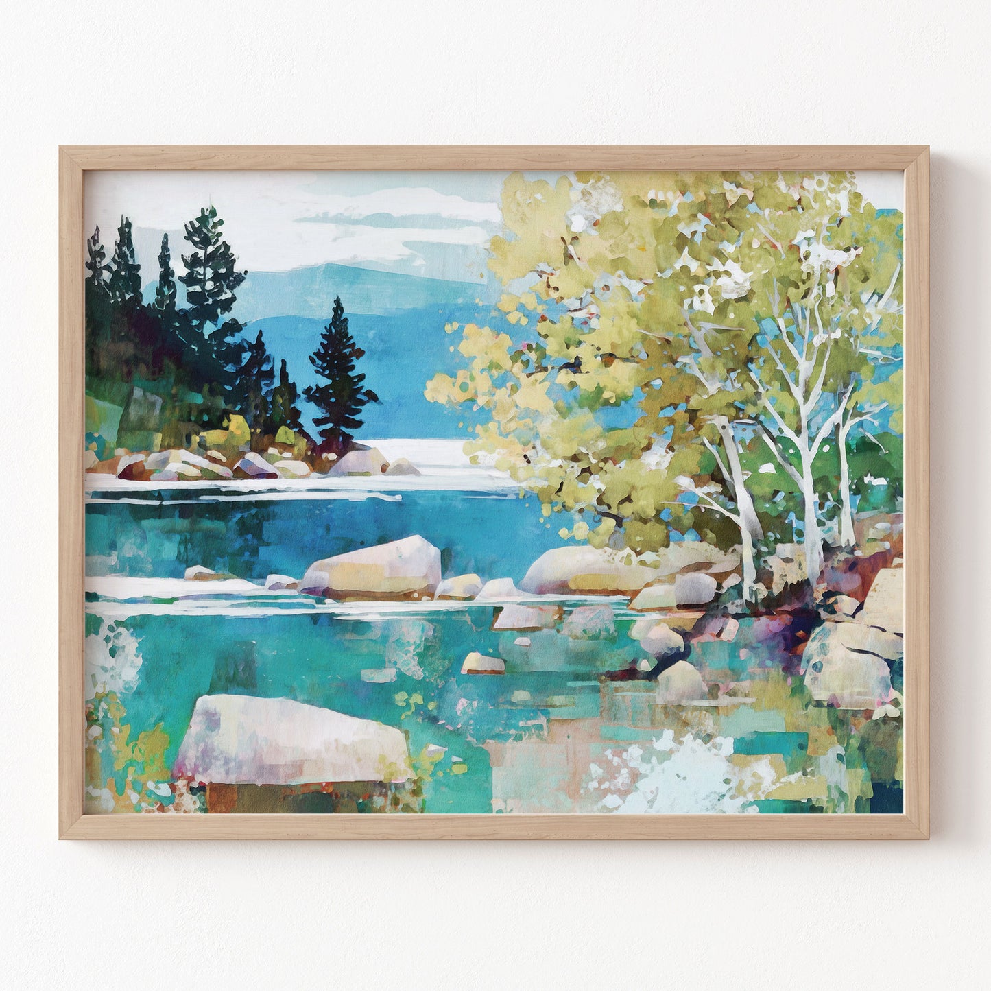 Framed artwork of a landscape with trees, water, and mountains.