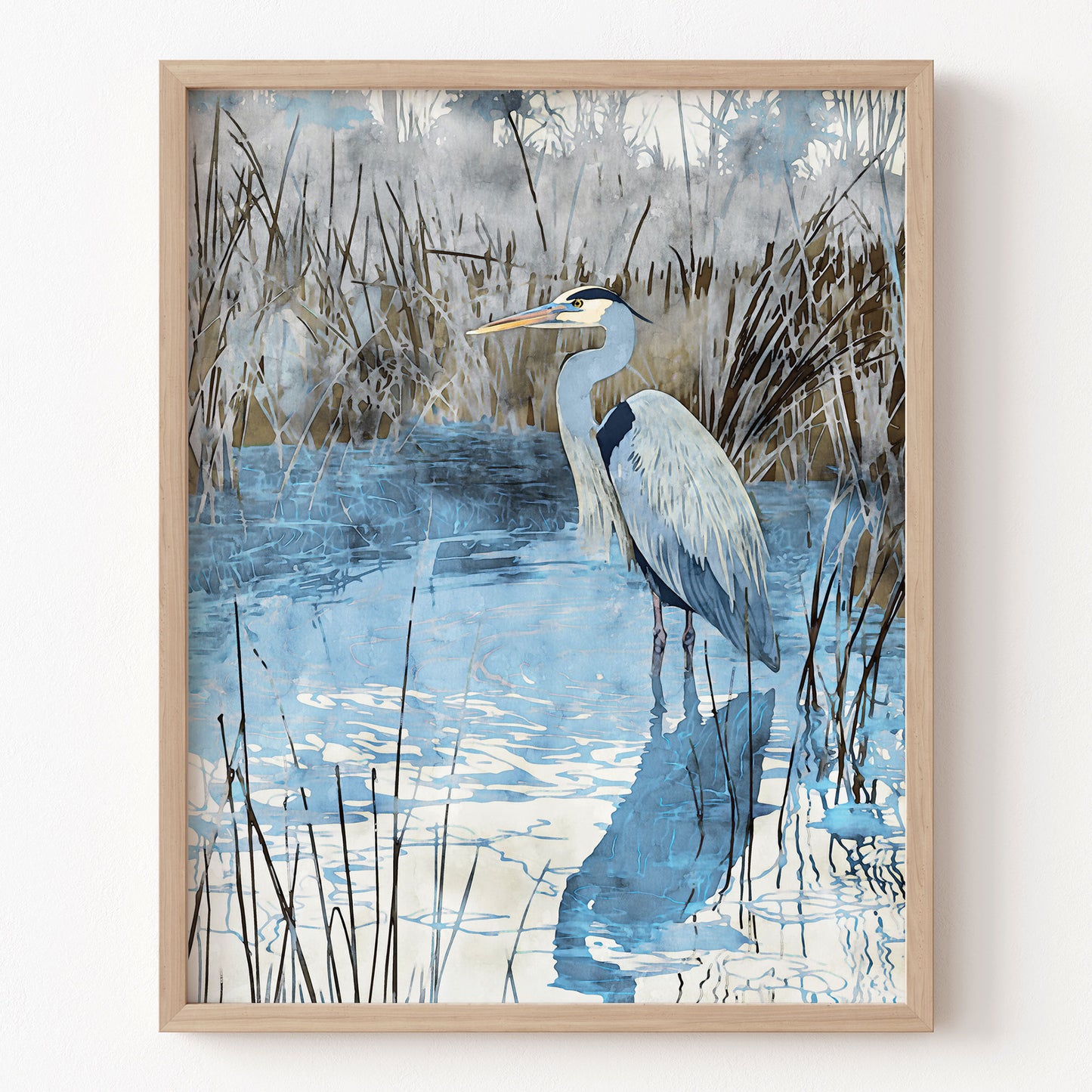 Framed artwork of a heron in a marshy area with reeds and water.