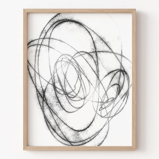 Framed abstract art with black lines on a white background