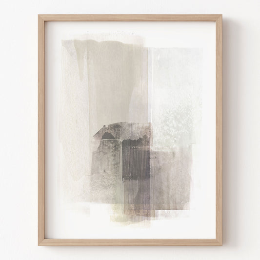 Framed abstract art print on a white wall
