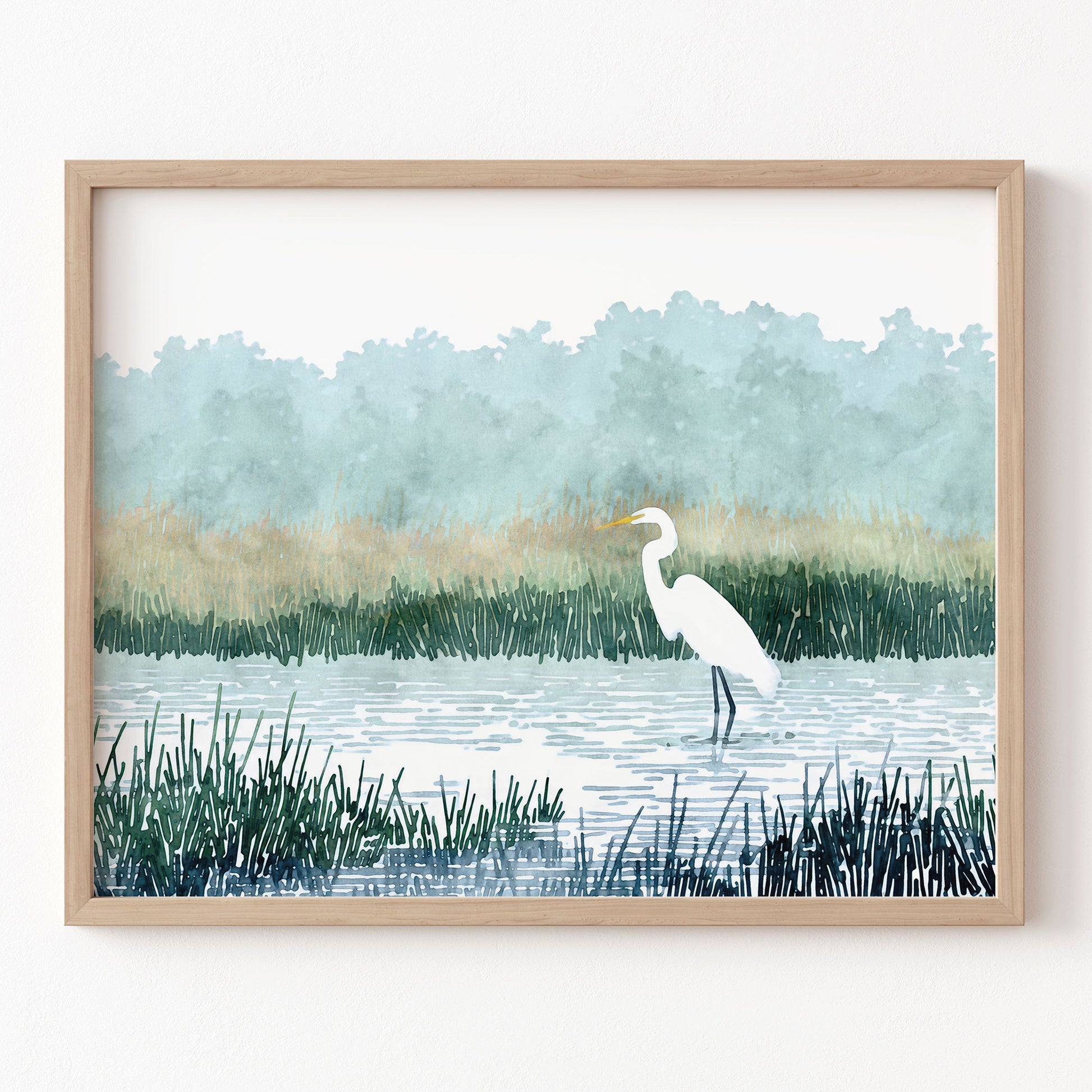 Framed artwork of a white egret in a marsh with a natural landscape.