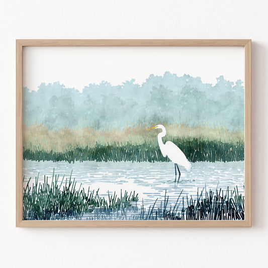 Framed artwork of a white egret in a marsh with a natural landscape.