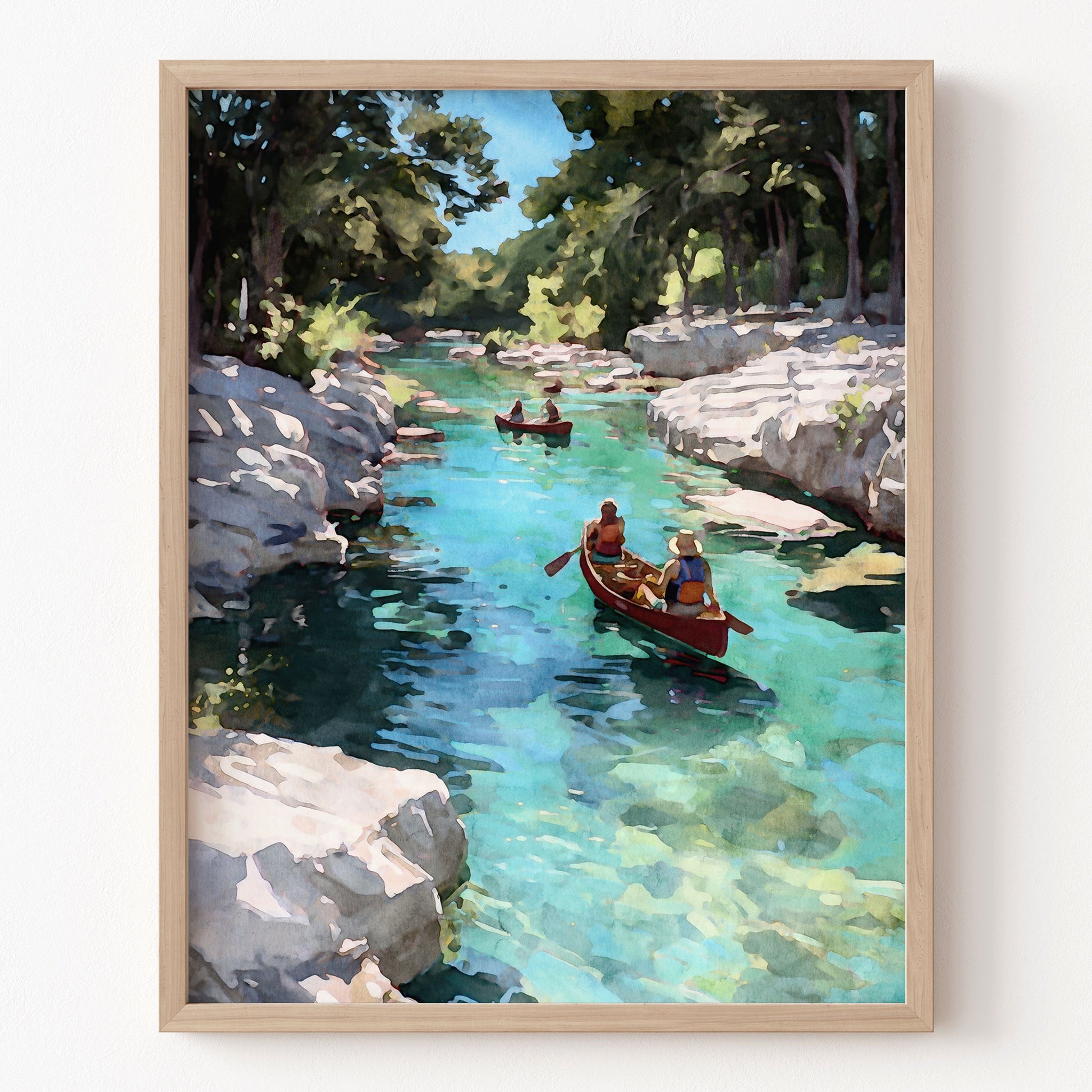 Framed painting of two people in canoes on a clear river with rocky banks.