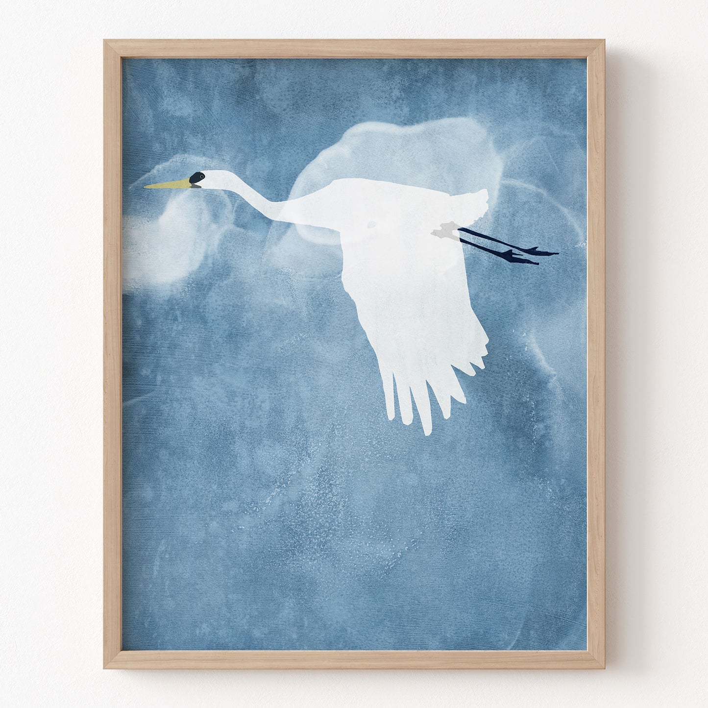 Framed artwork of a white bird on a blue textured background