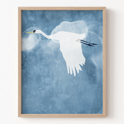 Framed artwork of a white bird on a blue textured background
