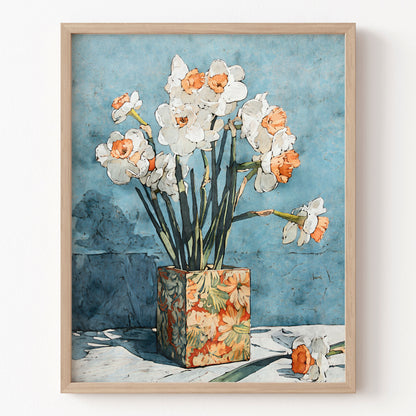 Framed artwork of flowers in a vase against a blue wall.