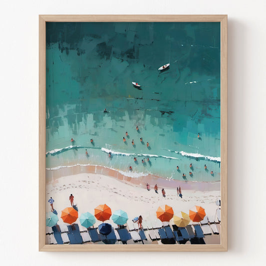 Framed artwork of a beach scene with colorful umbrellas and people.