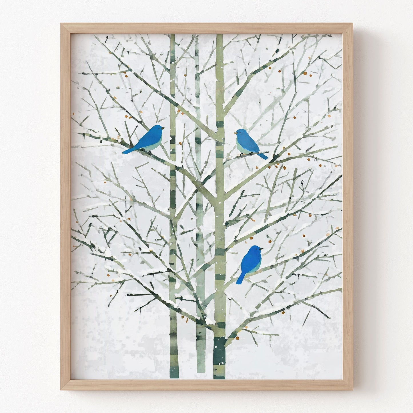 Framed artwork of blue birds on branches against a white background