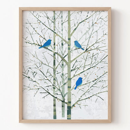 Framed artwork of blue birds on branches against a white background