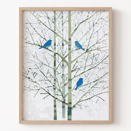 Framed artwork of blue birds on branches against a white background
