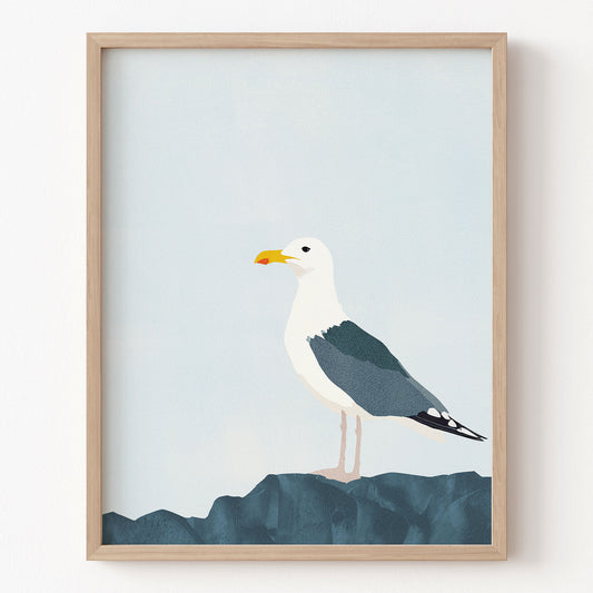 Framed artwork of a seagull on a blue background