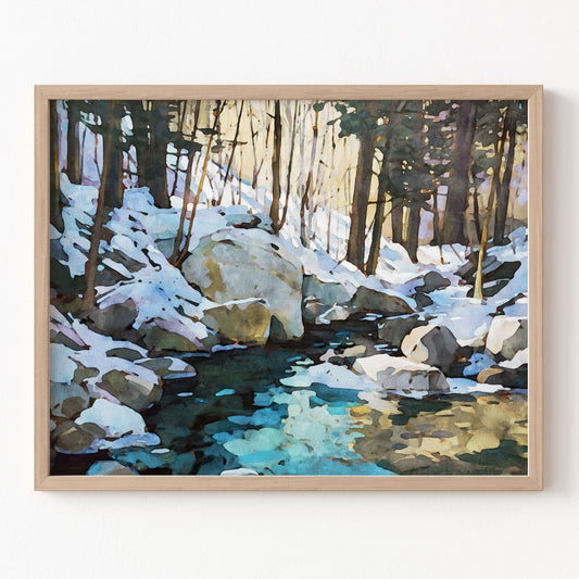 Framed artwork of a snowy forest scene with a stream.