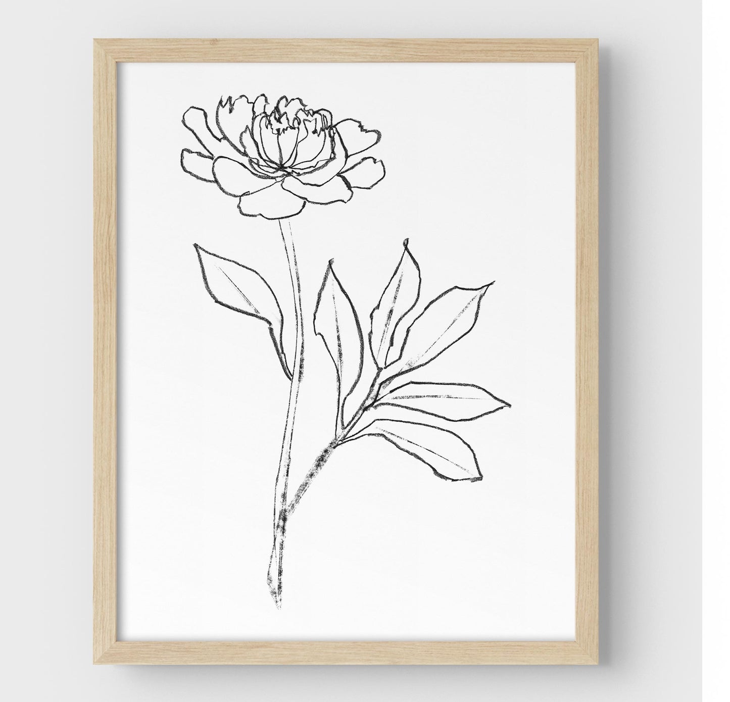Minimalist black-and-white line drawing of a peony flower, framed in natural wood and set against a white background.