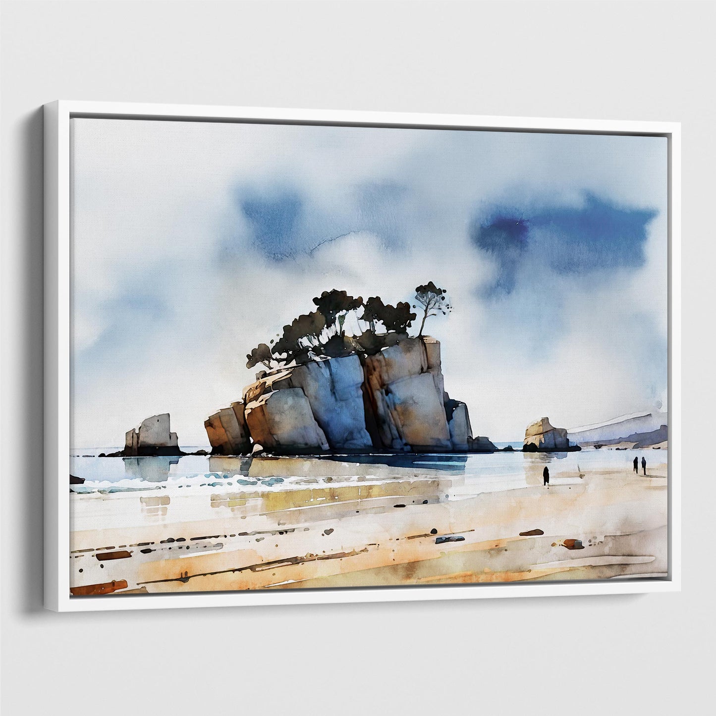 White framed canvas watercolor print of a coastal scene with a large rock formation topped with windswept trees, calm water reflections, and a sandy shore with a few distant figures.
