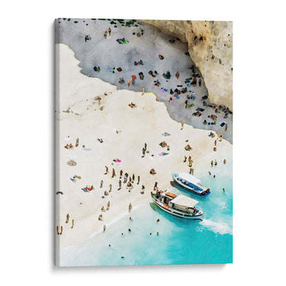 A canvas print of a watercolor-style artwork showing a crowded beach scene with two small boats on turquoise water and numerous sunbathers on the sandy shore.