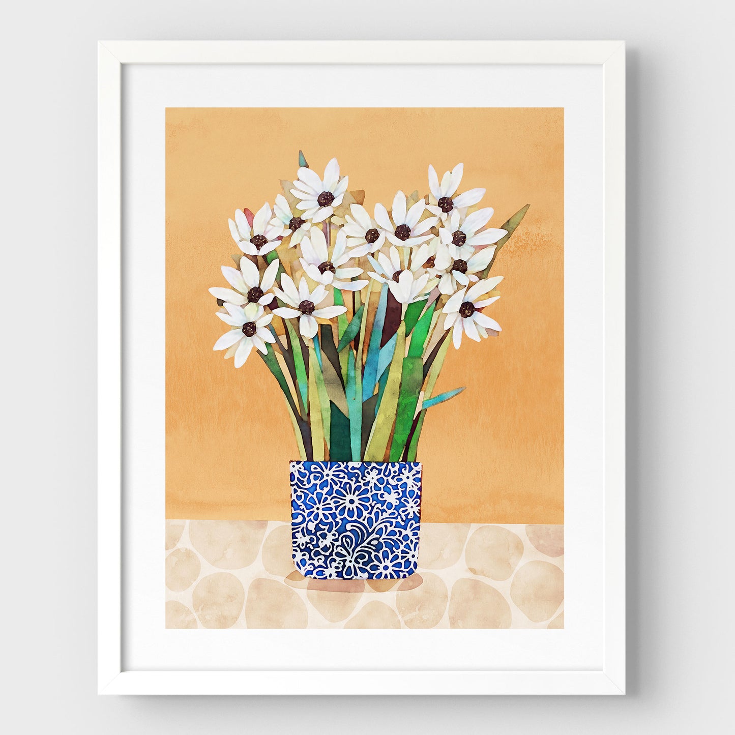 Print of white flowers with dark centers in a blue patterned vase on a beige patterned surface with an orange background, set in a white frame.