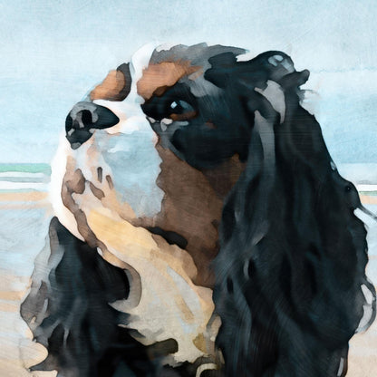 Close-up watercolor-style portrait of a tricolor Cavalier King Charles Spaniel at the beach, with soft blended brushstrokes. The dog’s expressive face and long dark ears are set against a muted blue sky and subtle ocean horizon, creating a calm, coastal feel.